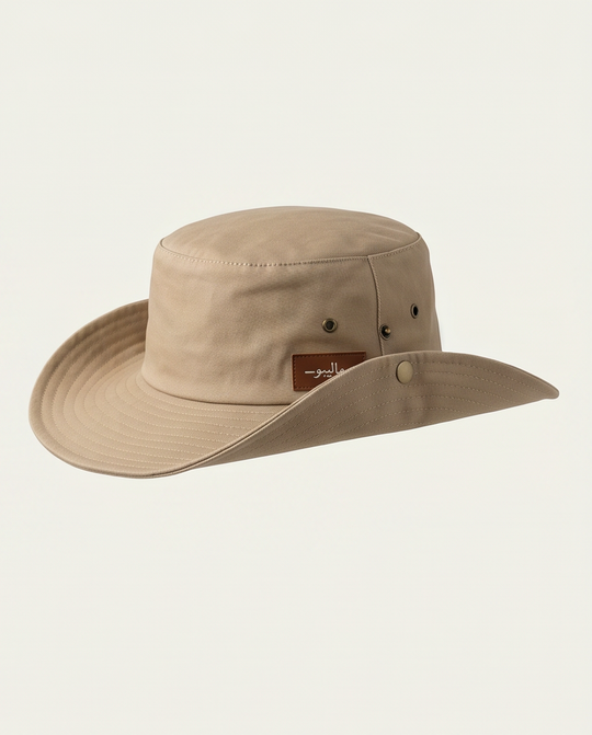 Beige wide-brimmed hat with a brand logo on a light beige background Malibu Beige Bucket Hat With Rope -ماليبو -