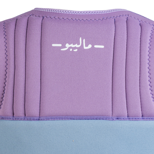 Purple and blue cushion with a brand logo on a white background