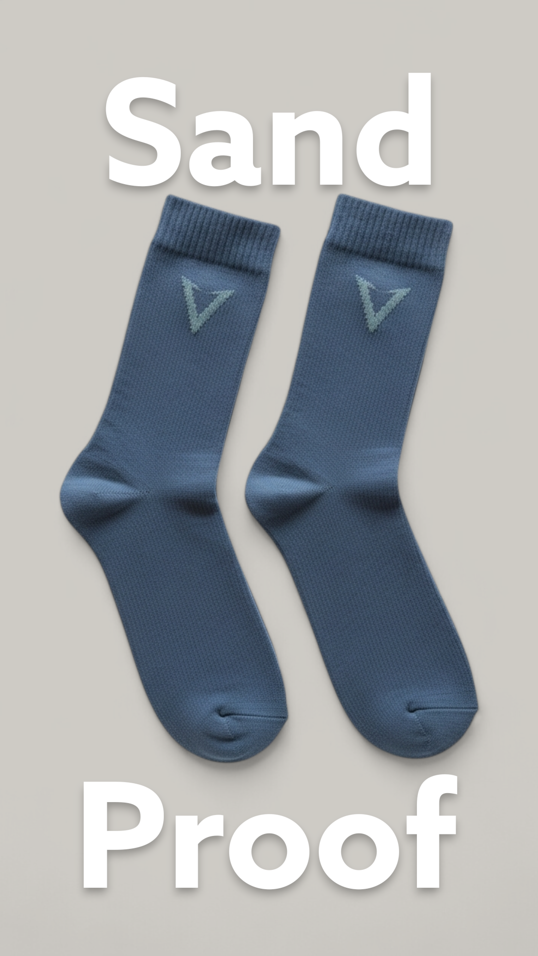 Pair of blue socks with a logo on a beige background, labeled 'Sand Proof'.