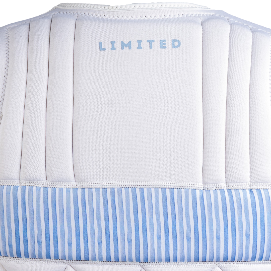 White and blue striped cushion with 'LIMITED' text on a white background