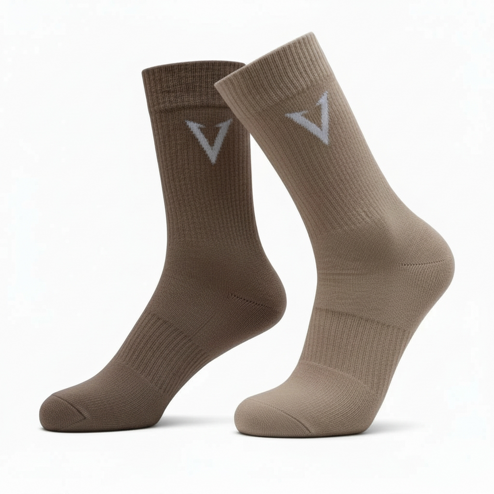 Two pairs of brown socks with a logo on a white background